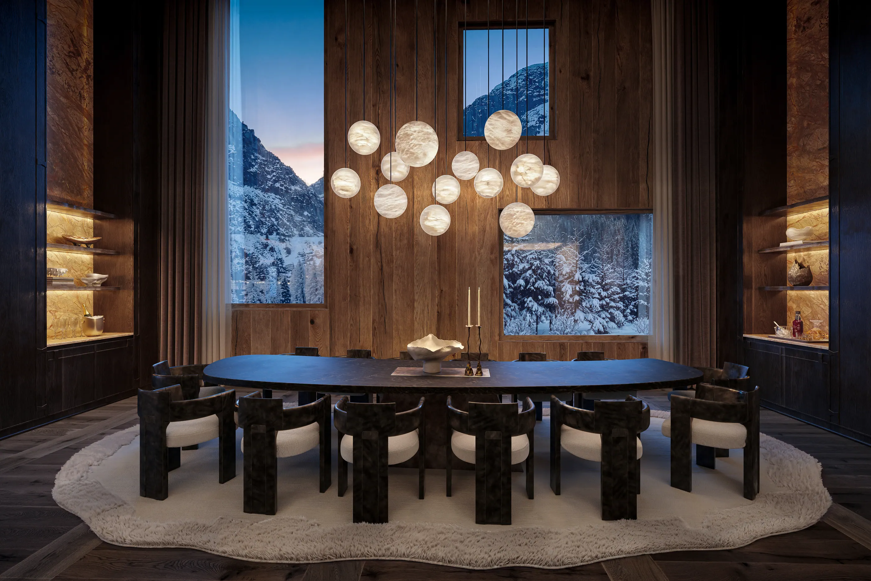 Private dining room with a stone table beneath alabaster globe lights